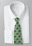 Hockey player tie Sage w/black