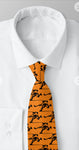 Hockey player tie orange & black